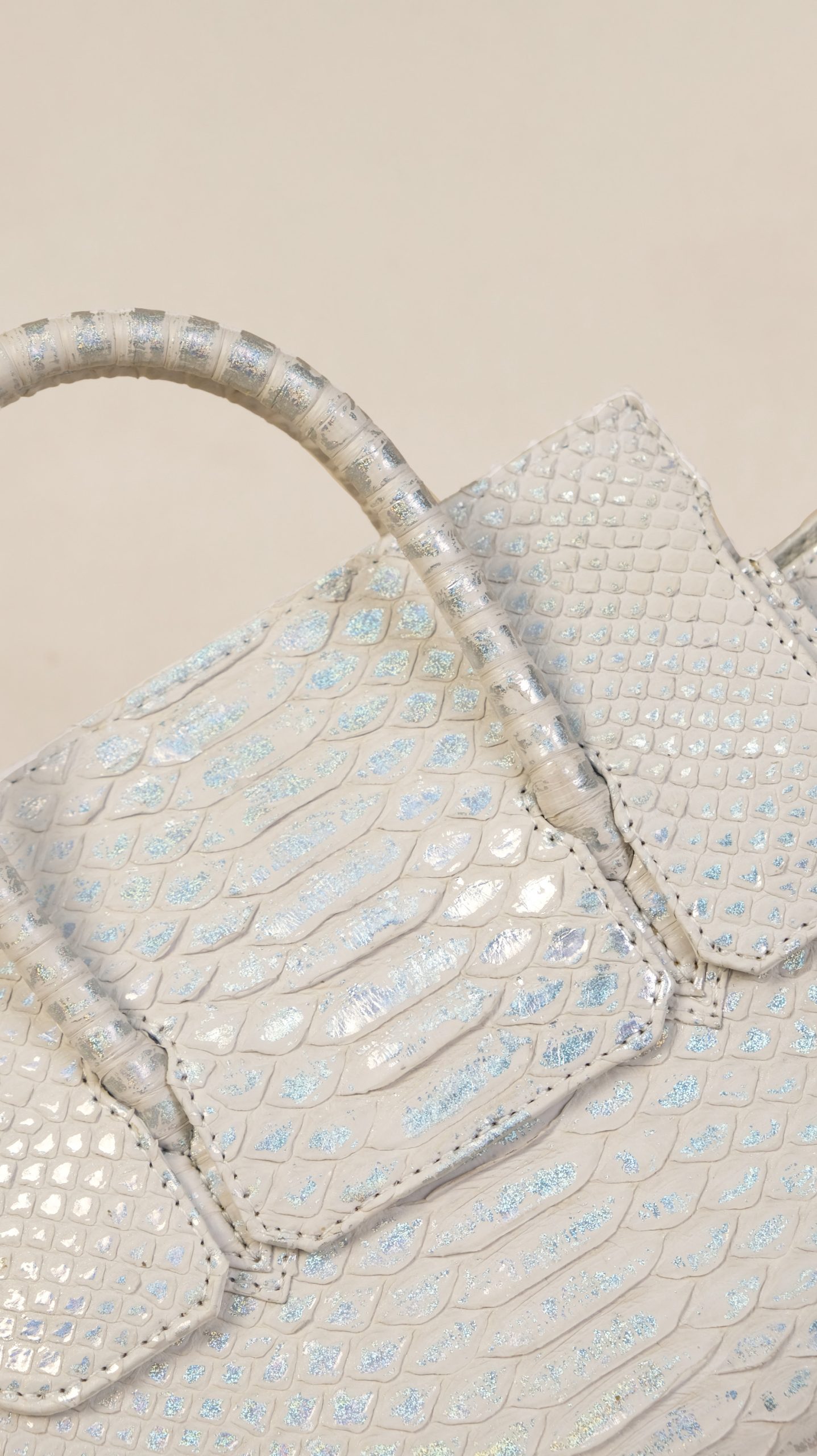exotic appeal and distinctive texture from KYRA's exotic leather handbag: Adriana Small in Hologram