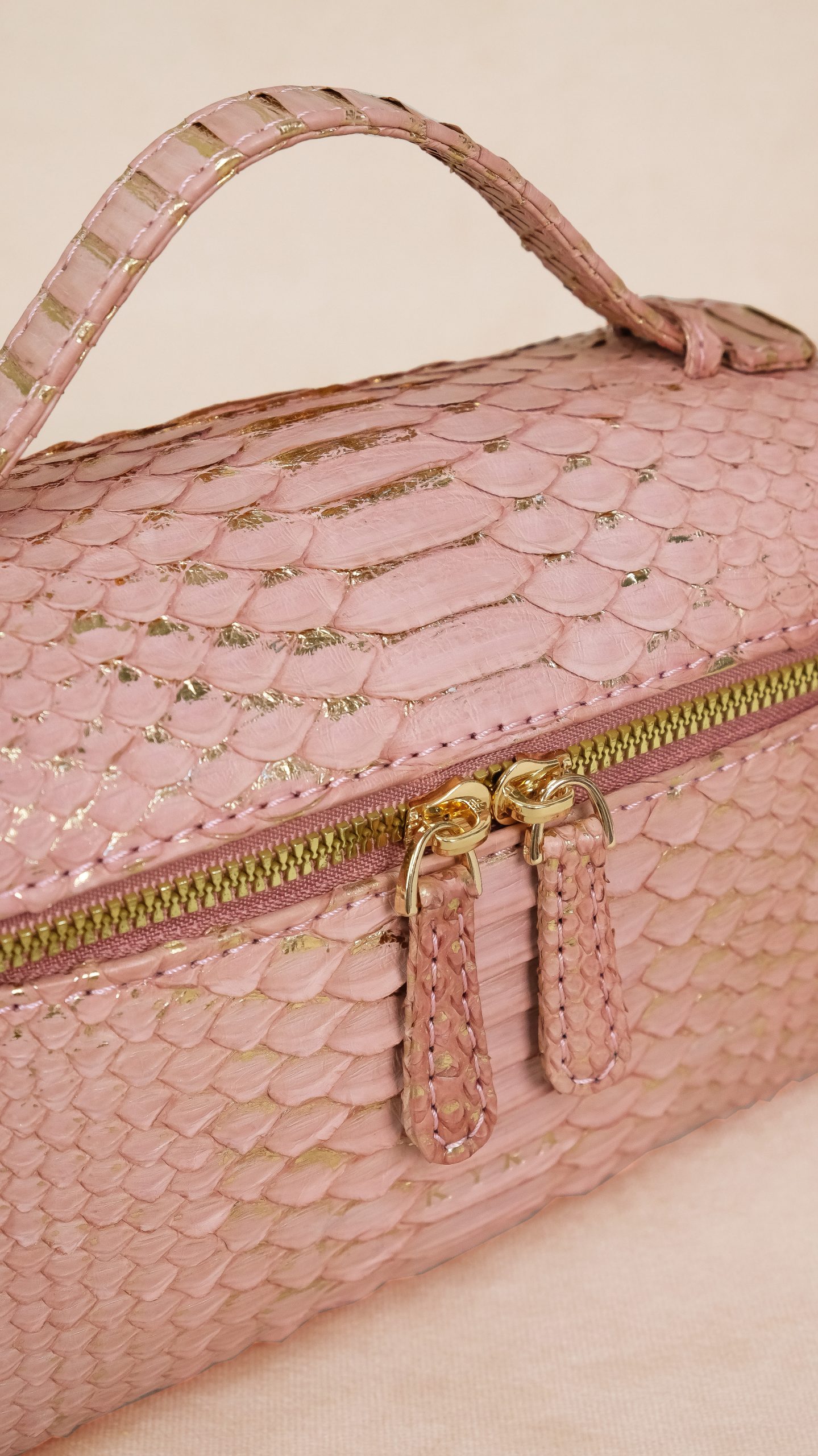 exotic leather handbag with zipper closure